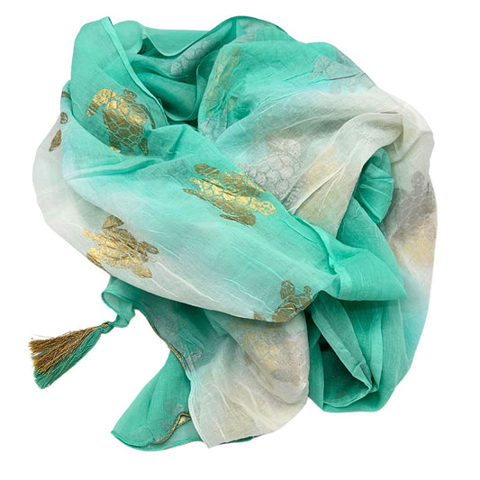 Colección Nómada Sari Mediterráneo - Pareo - Diseño de Tortuga en Blanco, Turquesa y Oro - Tienda Online de Productos Naturales y Ecológicos